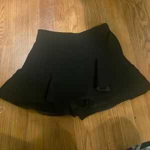 Sleek Black Mini Skirt with Ruffle